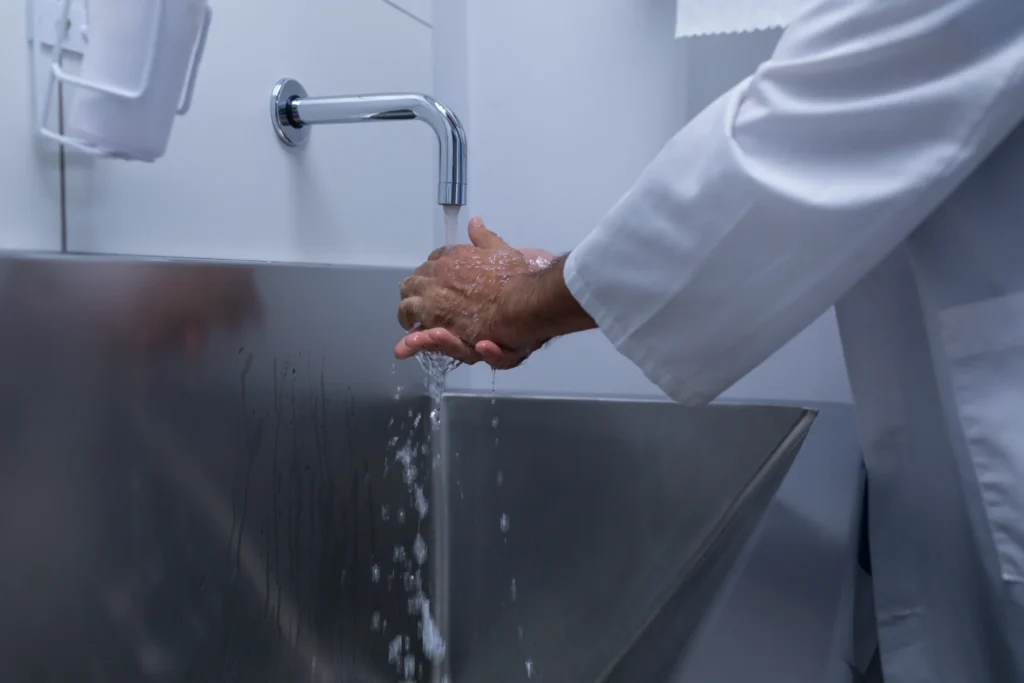 mid section caucasian male surgeon washing hand 2026 01 09 09 04 09 utc scaled