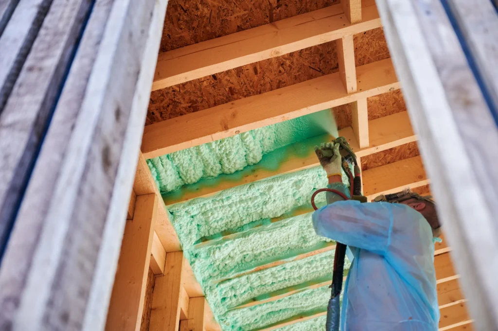 worker spraying polyurethane foam insulating w 2026 01 07 01 01 16 utc scaled